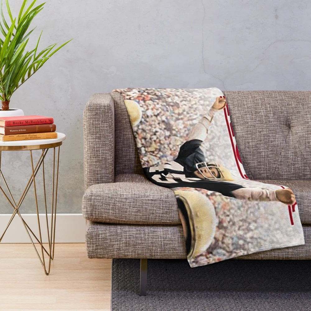 Plush blanket inspired by the biographical sports movie 'Rudy