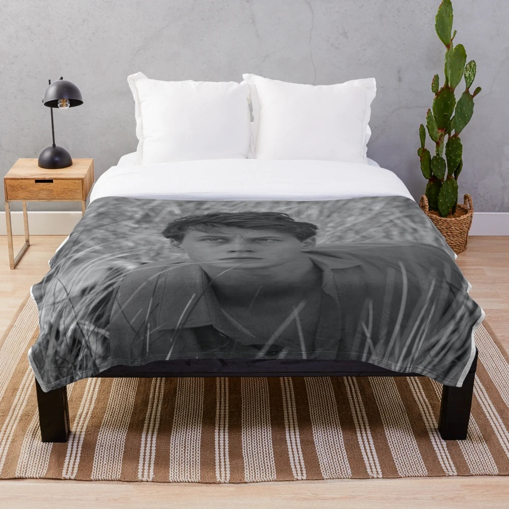 Soft, black and white plush blanket featuring film and movie elements