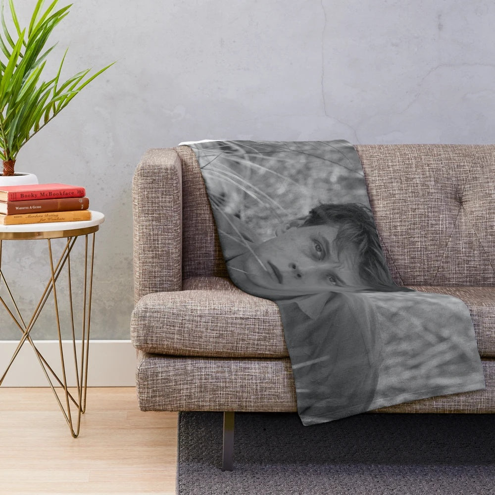 Soft, black and white plush blanket featuring film and movie elements