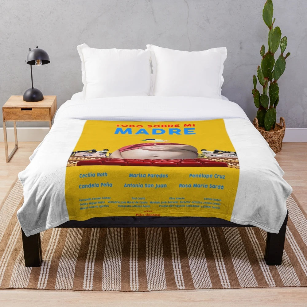 Plush blanket featuring imagery from the classic Spanish film "All About My Mother