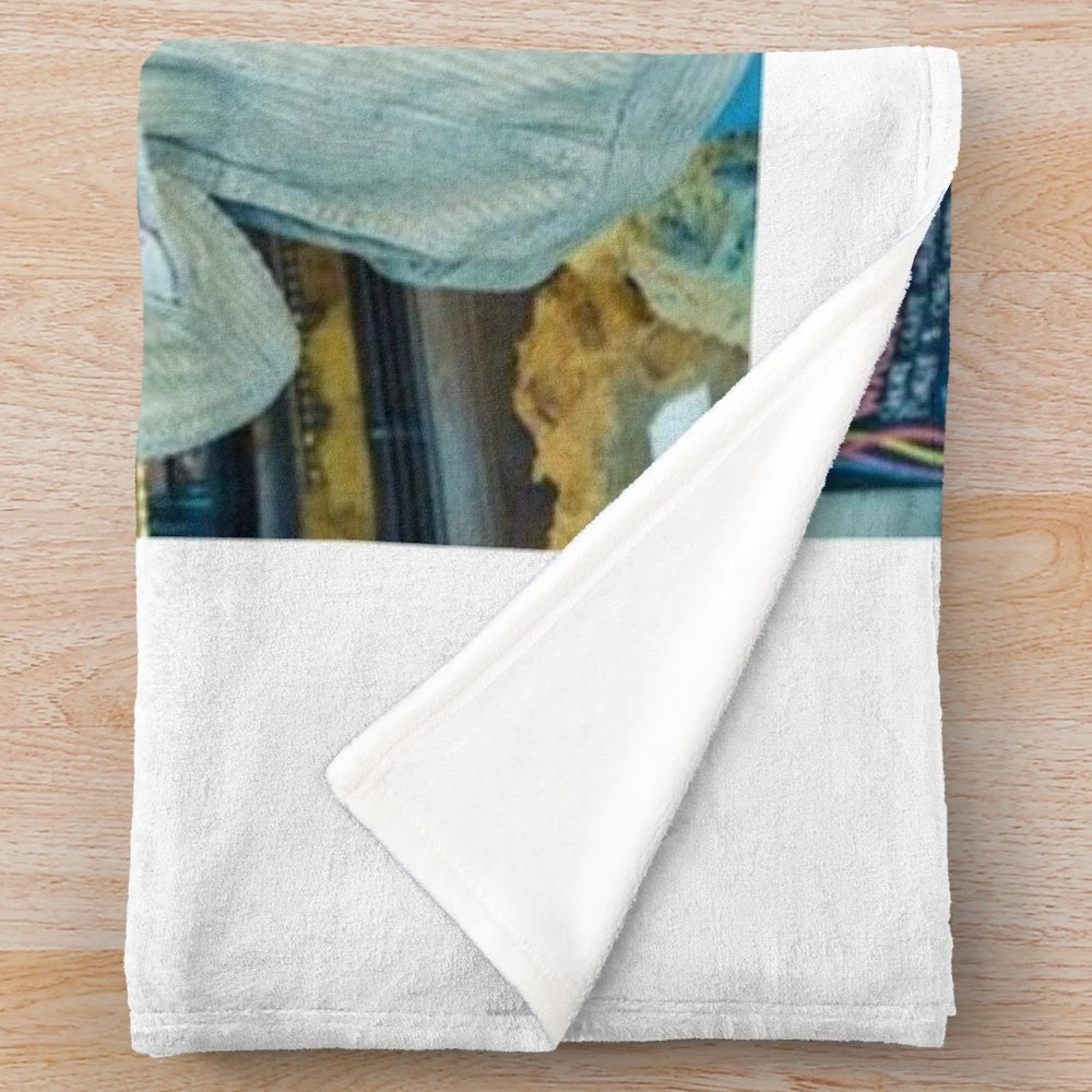 Cozy plush blanket featuring the artwork and branding of The Garden band