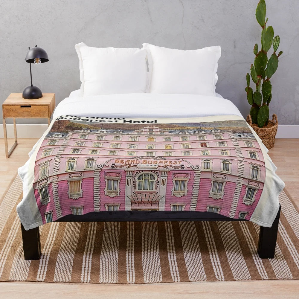 Plush blanket featuring elements from the movie The Grand Budapest Hotel