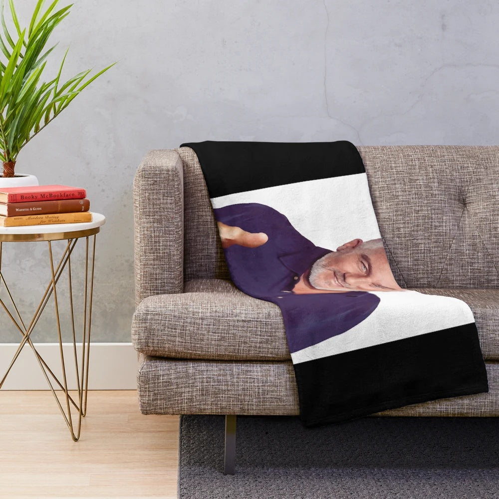 Plush blanket featuring the "Hollywood Handshake" design, inspired by the Great British Baking Show