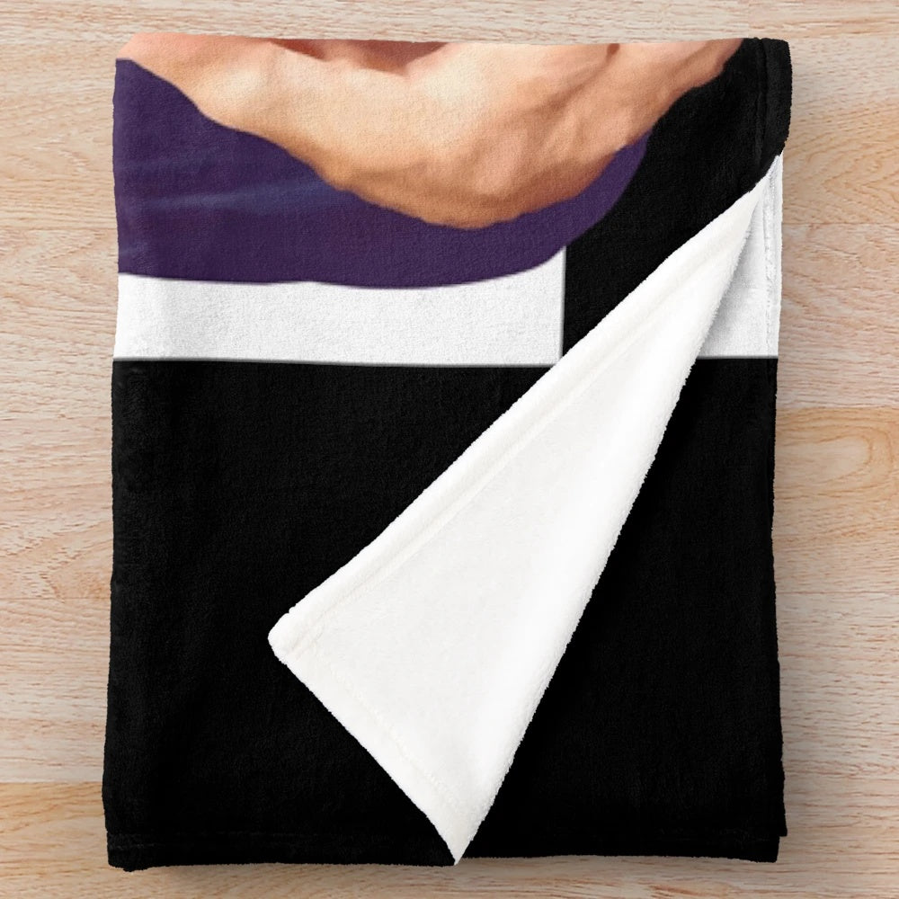 Plush blanket featuring the "Hollywood Handshake" design, inspired by the Great British Baking Show