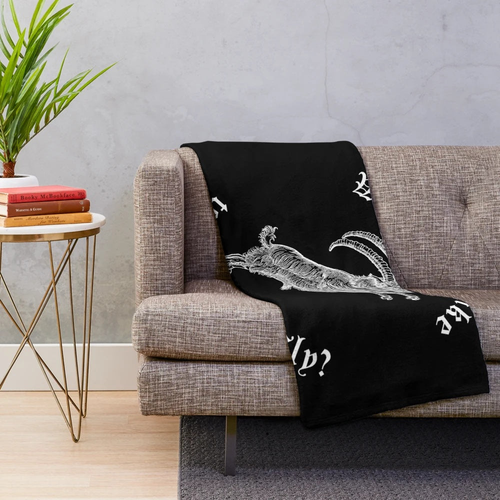 Cozy plush blanket with gothic and witch-inspired design