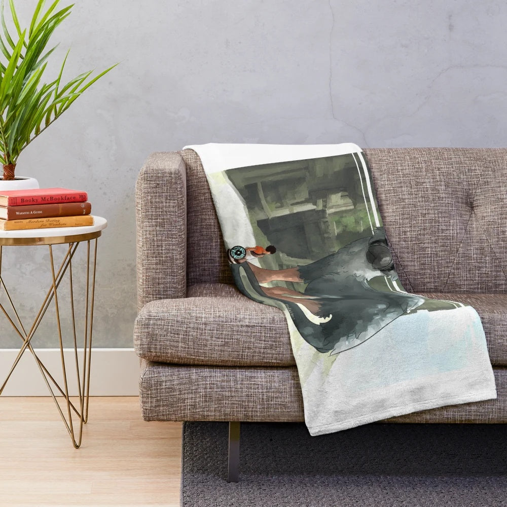 Trico-inspired plush blanket featuring a soft, snuggly design