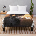 Plush blanket with The Last of Us inspired design featuring Ellie and Joel
