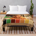 Plush blanket featuring the vibrant color palette from the Wes Anderson film The Royal Tenenbaums