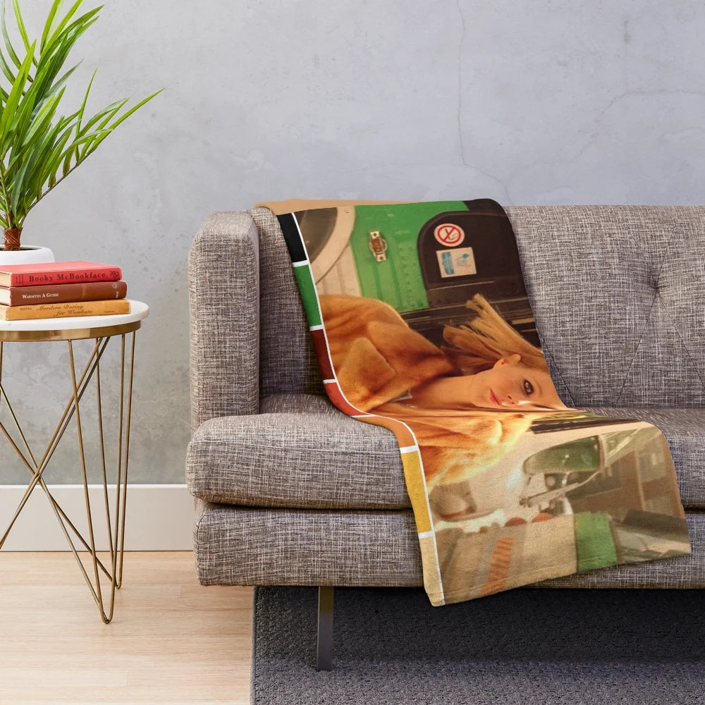 Plush blanket featuring the vibrant color palette from the Wes Anderson film The Royal Tenenbaums