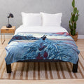 Plush blanket with snowy mountain landscape design