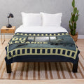 Plush blanket featuring a scene from the cult classic Swedish film "Du levande