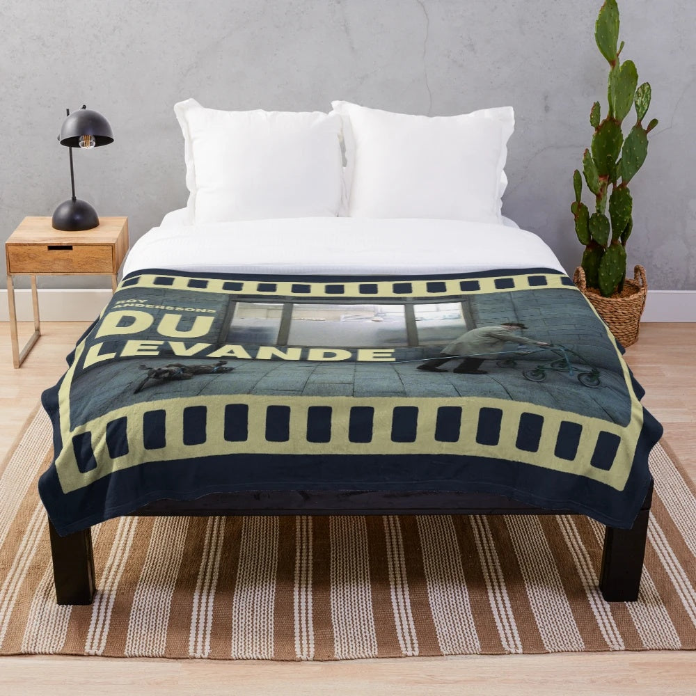 Plush blanket featuring a scene from the cult classic Swedish film "Du levande