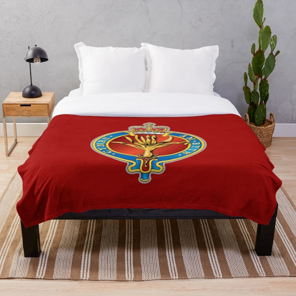 Plush blanket featuring the crest and colors of the Welsh Guards of the British Army
