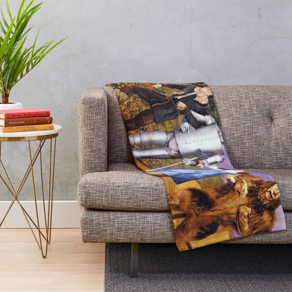 Plush blanket featuring characters and imagery from the classic film The Wizard of Oz