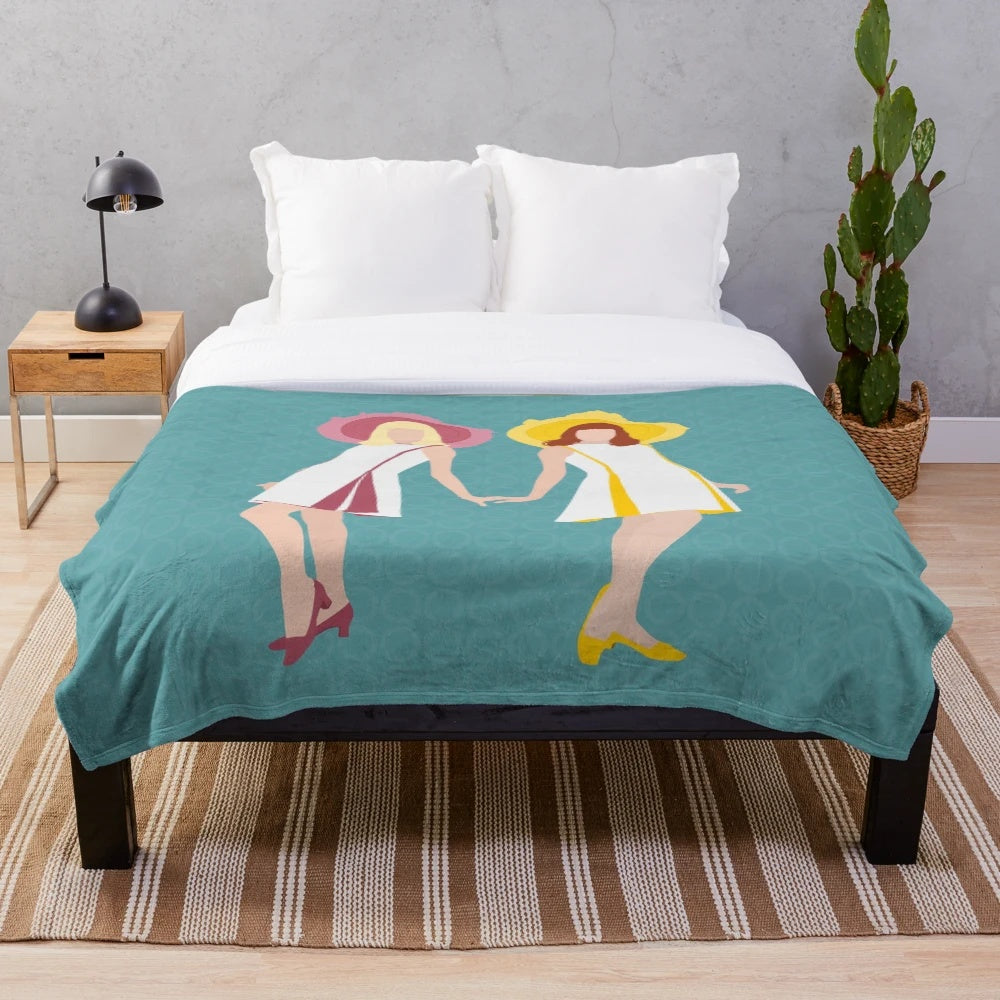 Soft and plush blanket featuring imagery from the classic French film The Young Girls of Rochefort