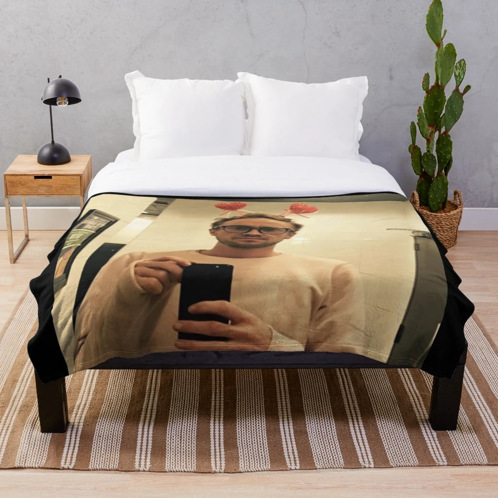 Soft and cozy plush blanket featuring Tom Felton's character Draco Malfoy