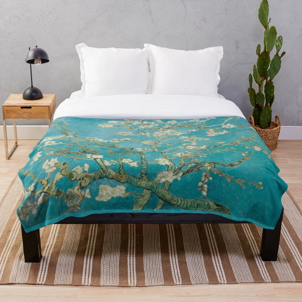 Plush blanket featuring Vincent Van Gogh's Almond Blossoms painting