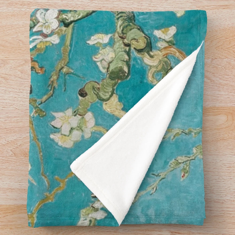 Plush blanket featuring Vincent Van Gogh's Almond Blossoms painting