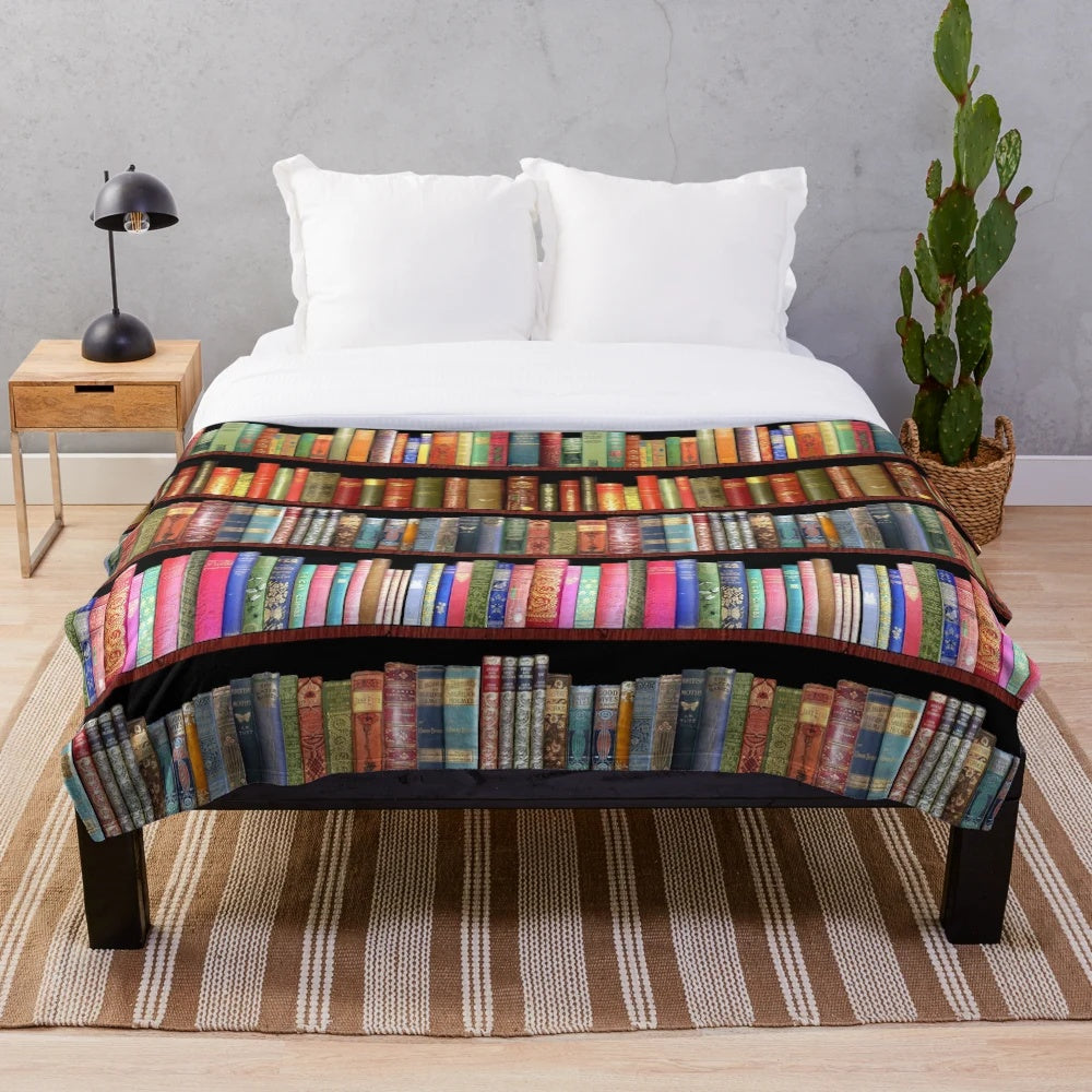 Plush blanket featuring vintage book covers and classic literature designs