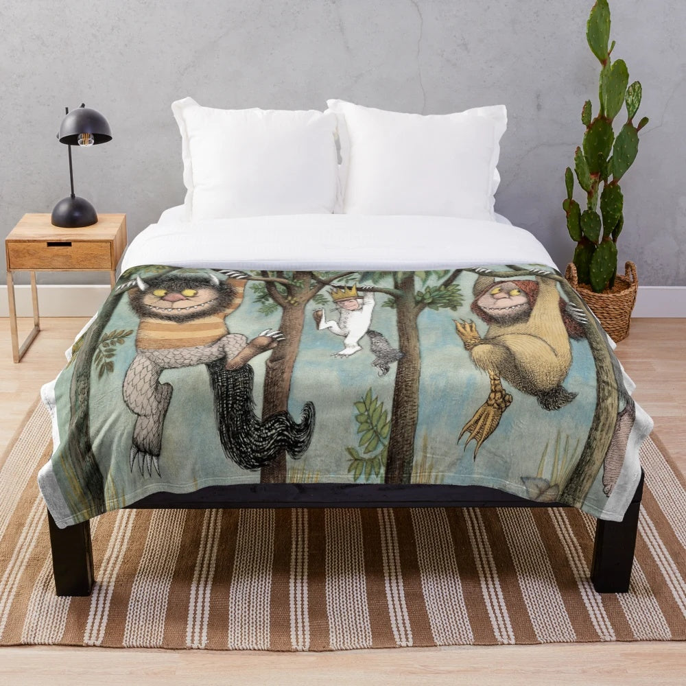 Cozy plush blanket featuring characters from the classic children's book "Where the Wild Things Are