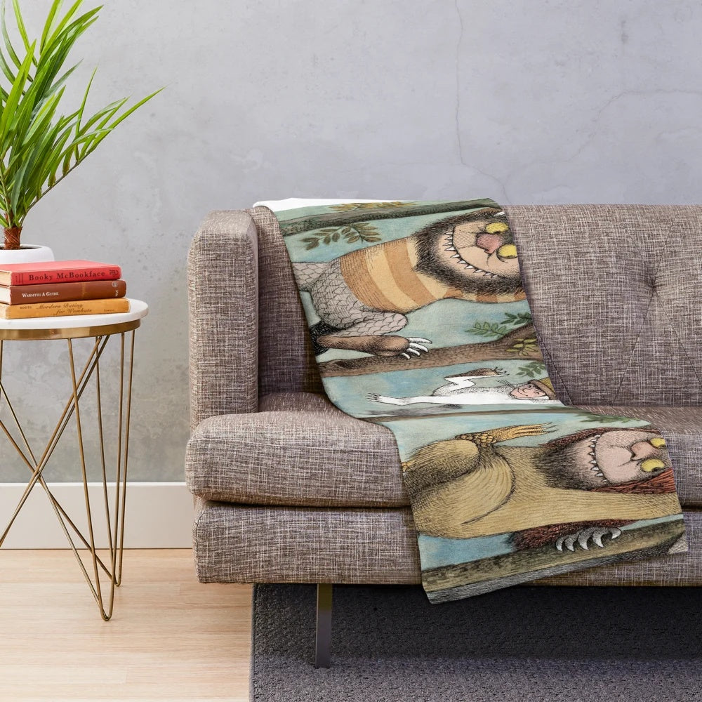 Cozy plush blanket featuring characters from the classic children's book "Where the Wild Things Are