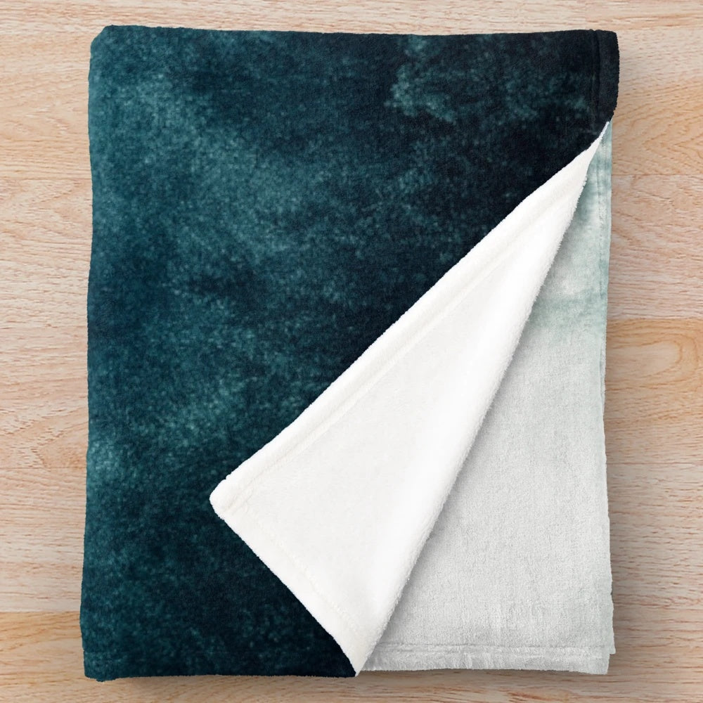 Plush blanket featuring a dreamy, foggy forest landscape