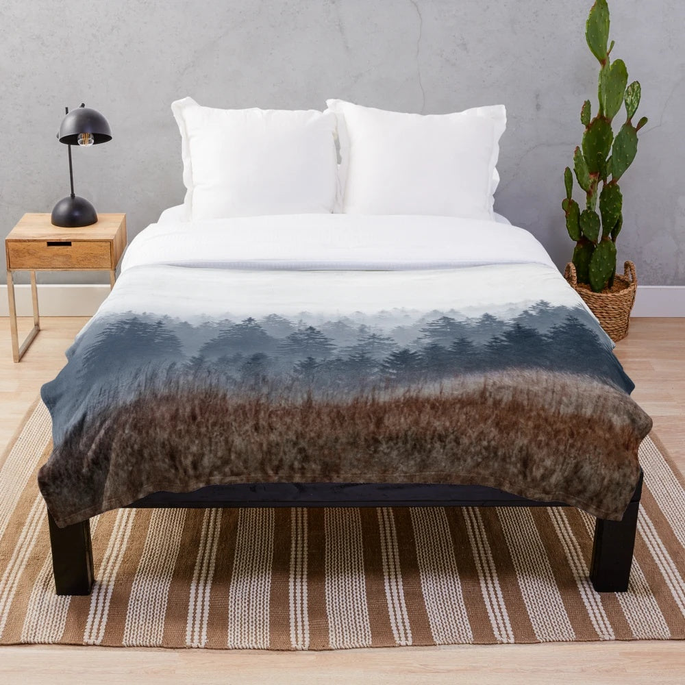 Plush blanket featuring a misty autumn wilderness forest landscape