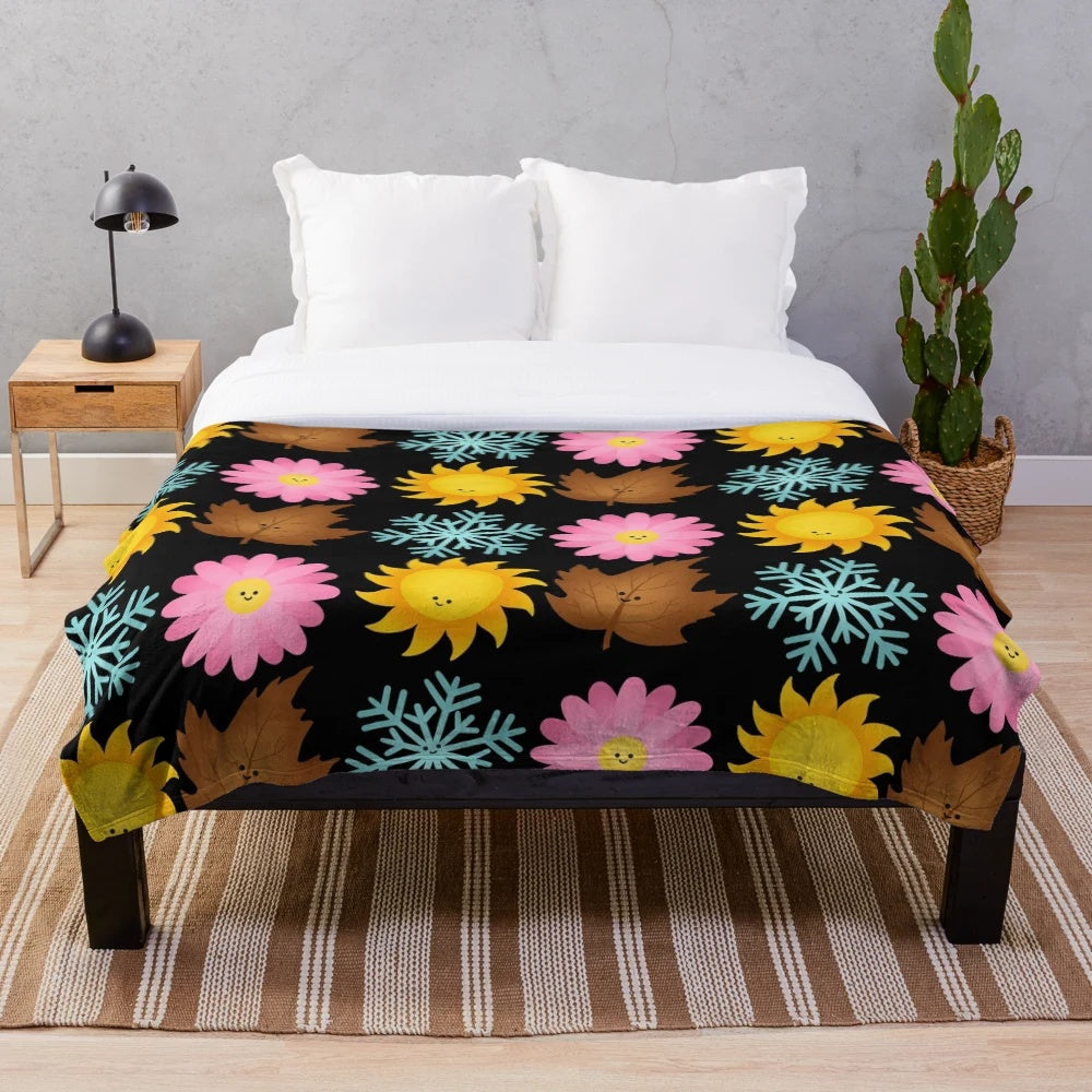Cozy plush blanket with happy seasonal designs