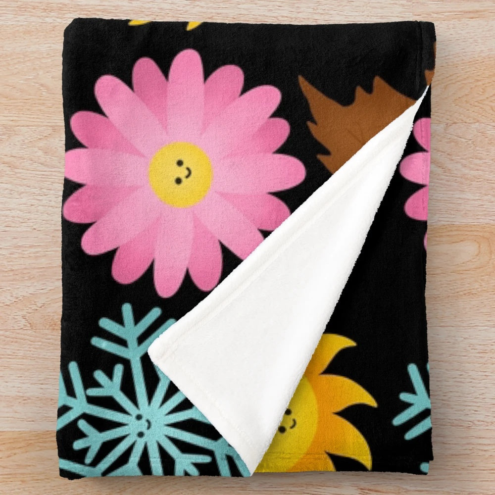 Cozy plush blanket with happy seasonal designs