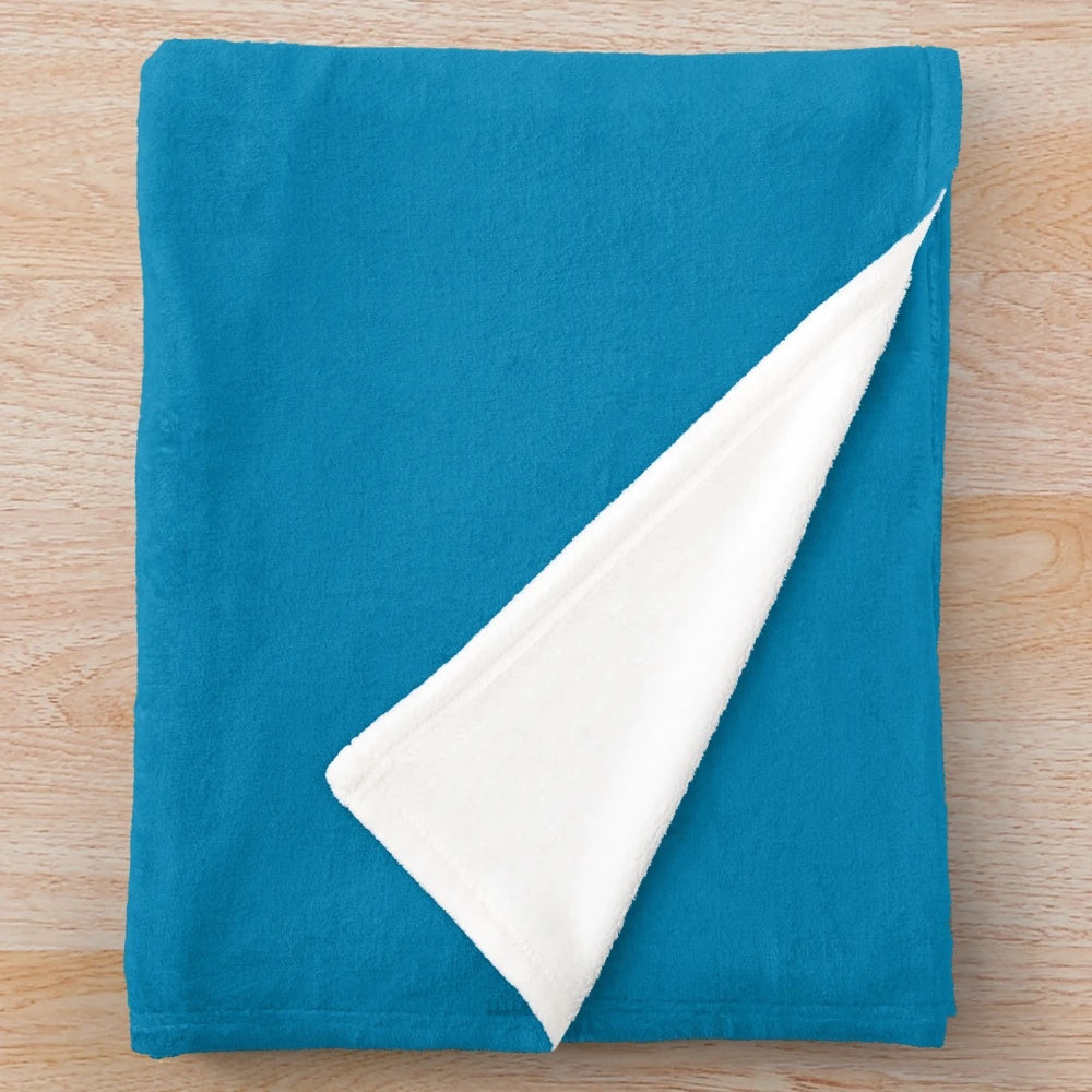 Soft and cozy plush blanket in various colors and patterns, perfect for summer nights