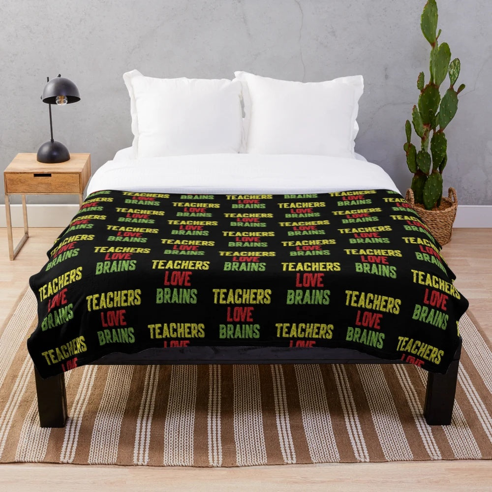 Plush blanket with "Teachers Love Brains" design