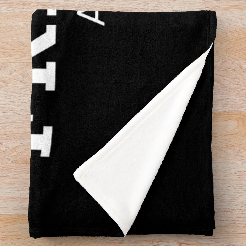 Plush blanket featuring a cyclist riding a bicycle through the streets of Amsterdam