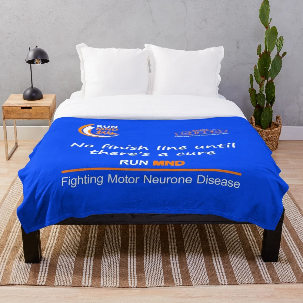 Soft plush blanket with motor neurone disease awareness design