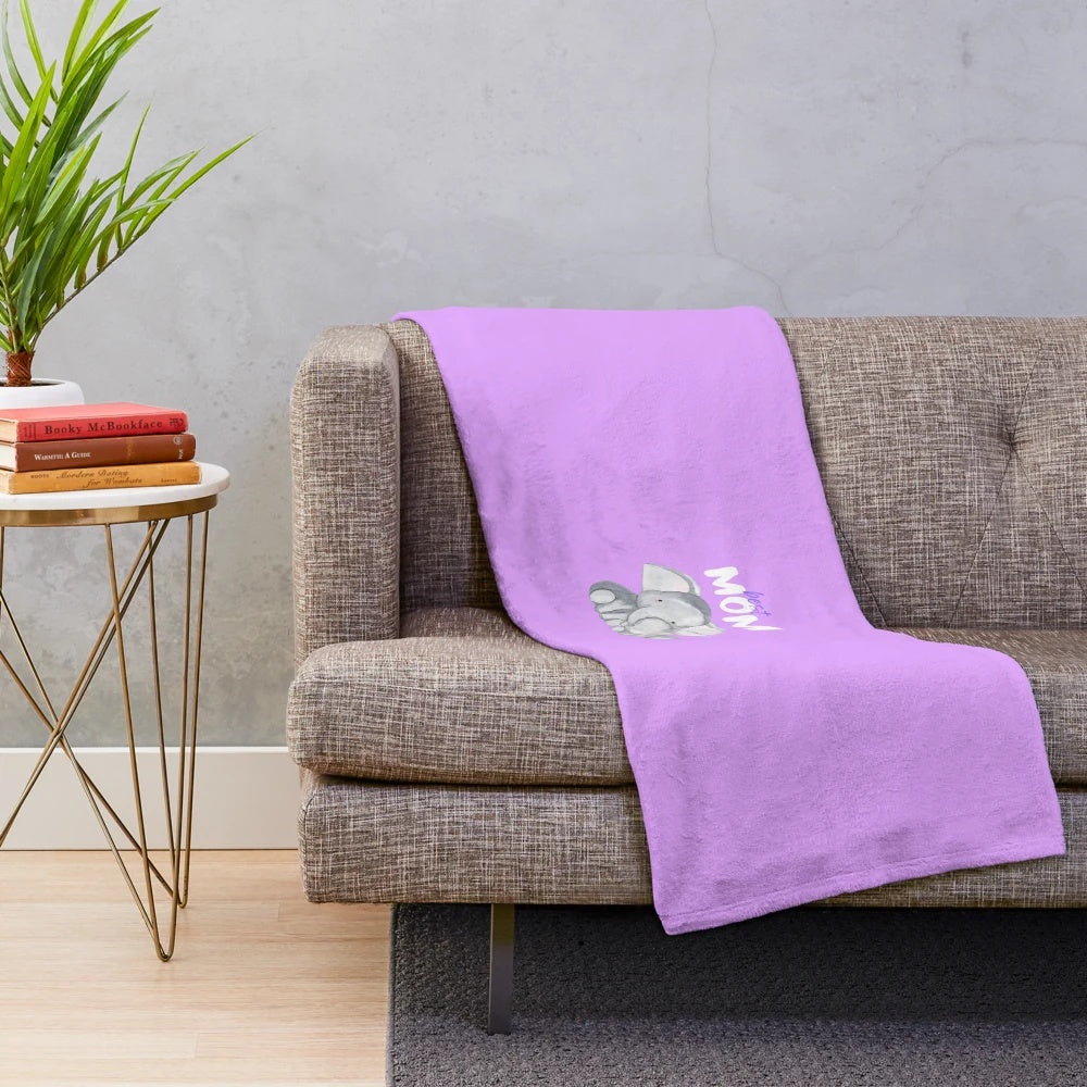 A soft and comfortable plush blanket with the text "Best MOM #1" printed on it.