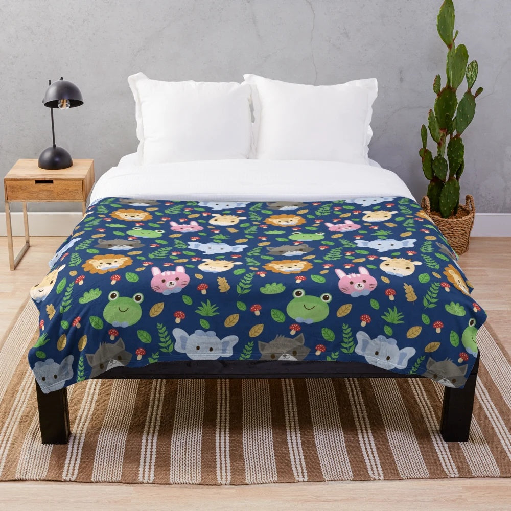 Plush blanket featuring a cute animal with sacred pattern design