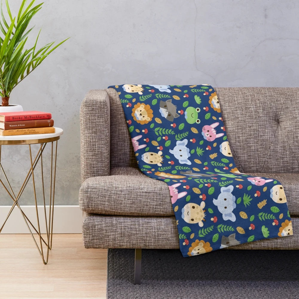 Plush blanket featuring a cute animal with sacred pattern design