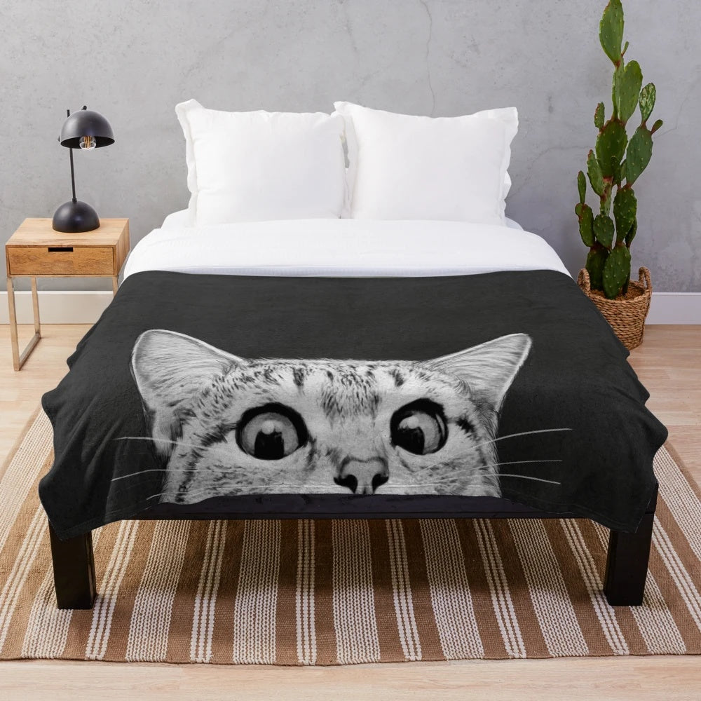 Plush blanket with black and white animal print design