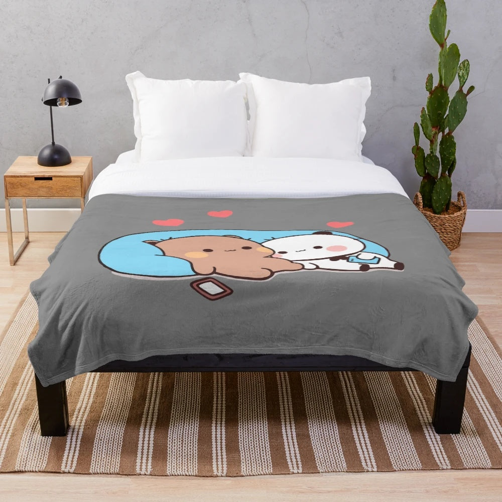Plush blanket featuring DuDu bear and BuBu panda in a loving embrace