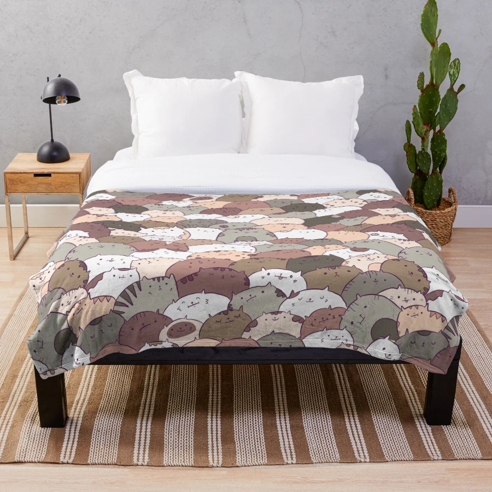 Cozy plush blanket featuring a cute cat pattern design