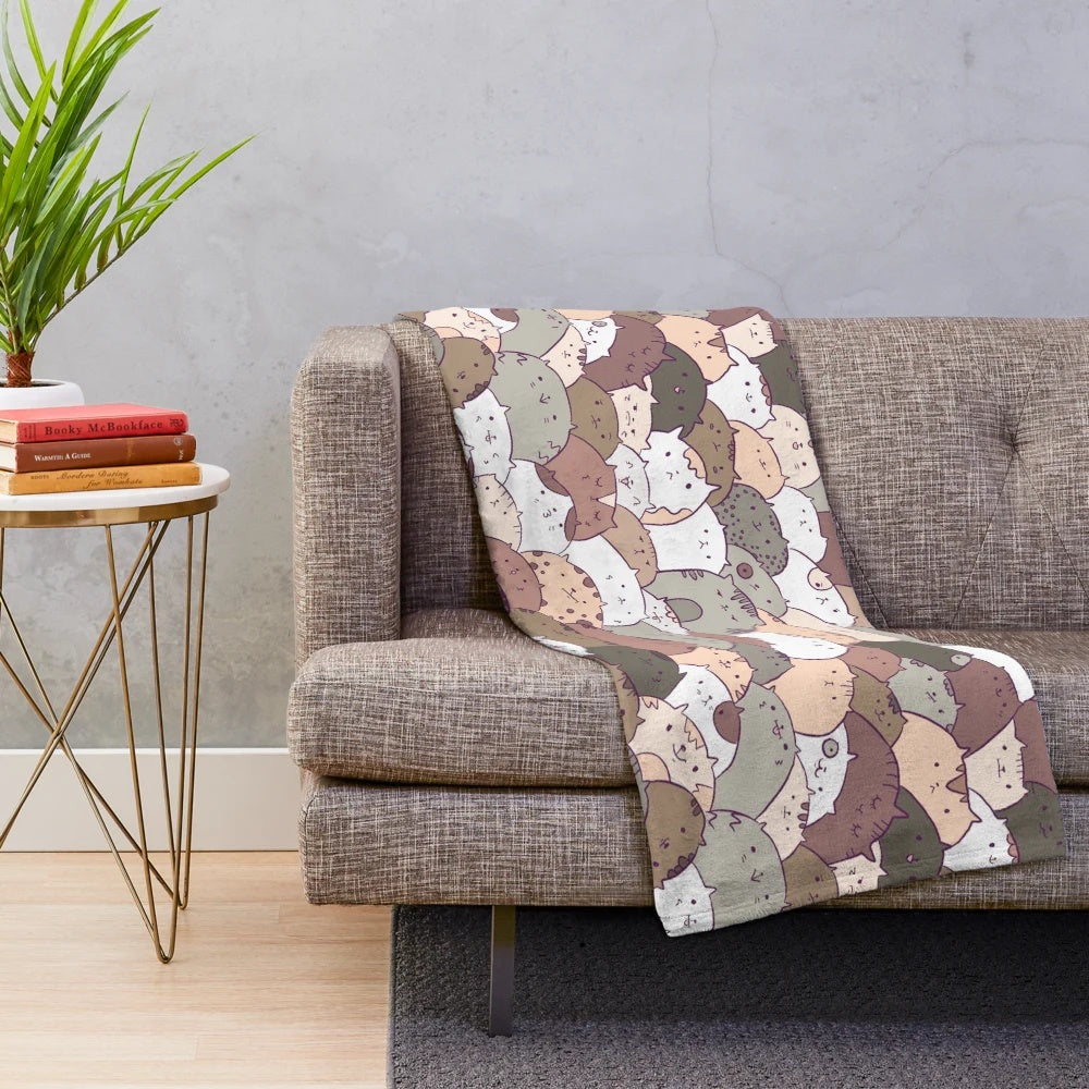 Cozy plush blanket featuring a cute cat pattern design