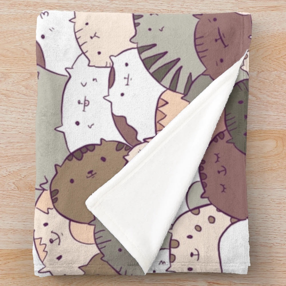 Cozy plush blanket featuring a cute cat pattern design