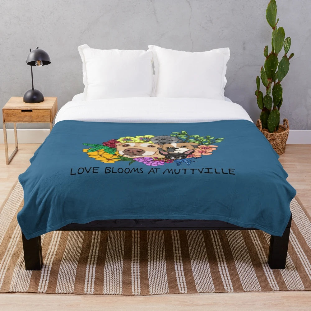 Plush blanket featuring cute dogs and blooming flowers