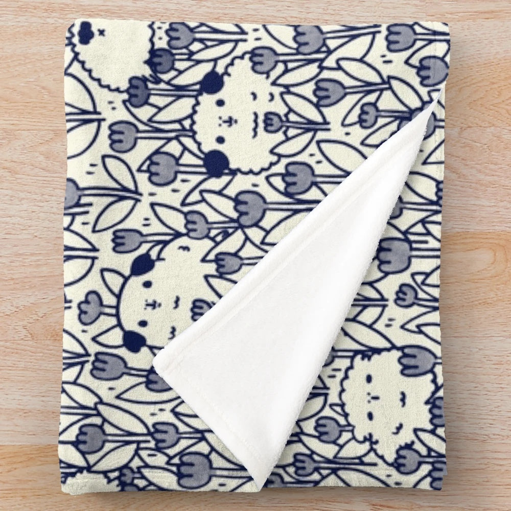 Soft and cuddly plush blanket featuring a charming navy blue and ivory guinea pig and flower pattern design