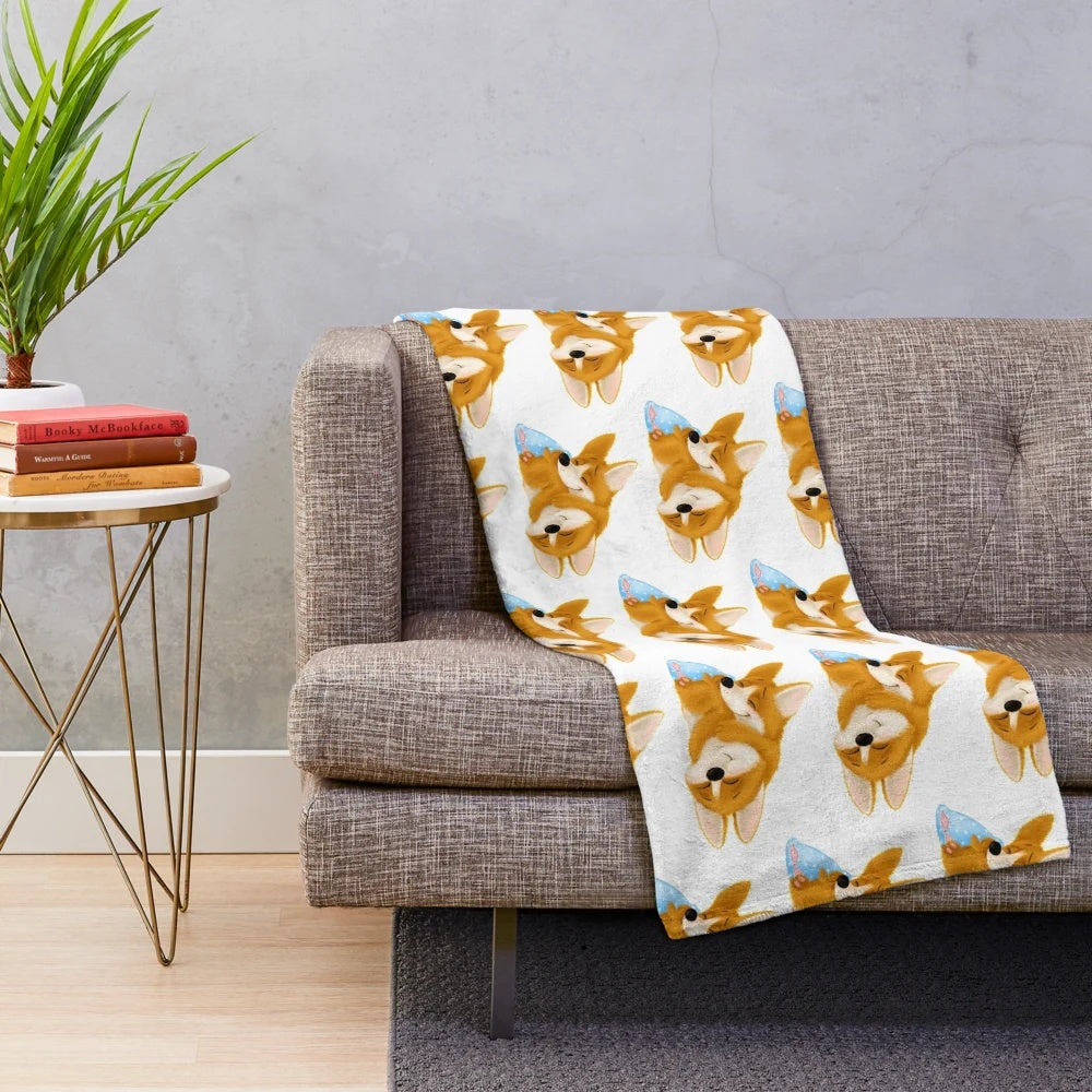 Cute sleeping corgi puppy couple on a plush blanket