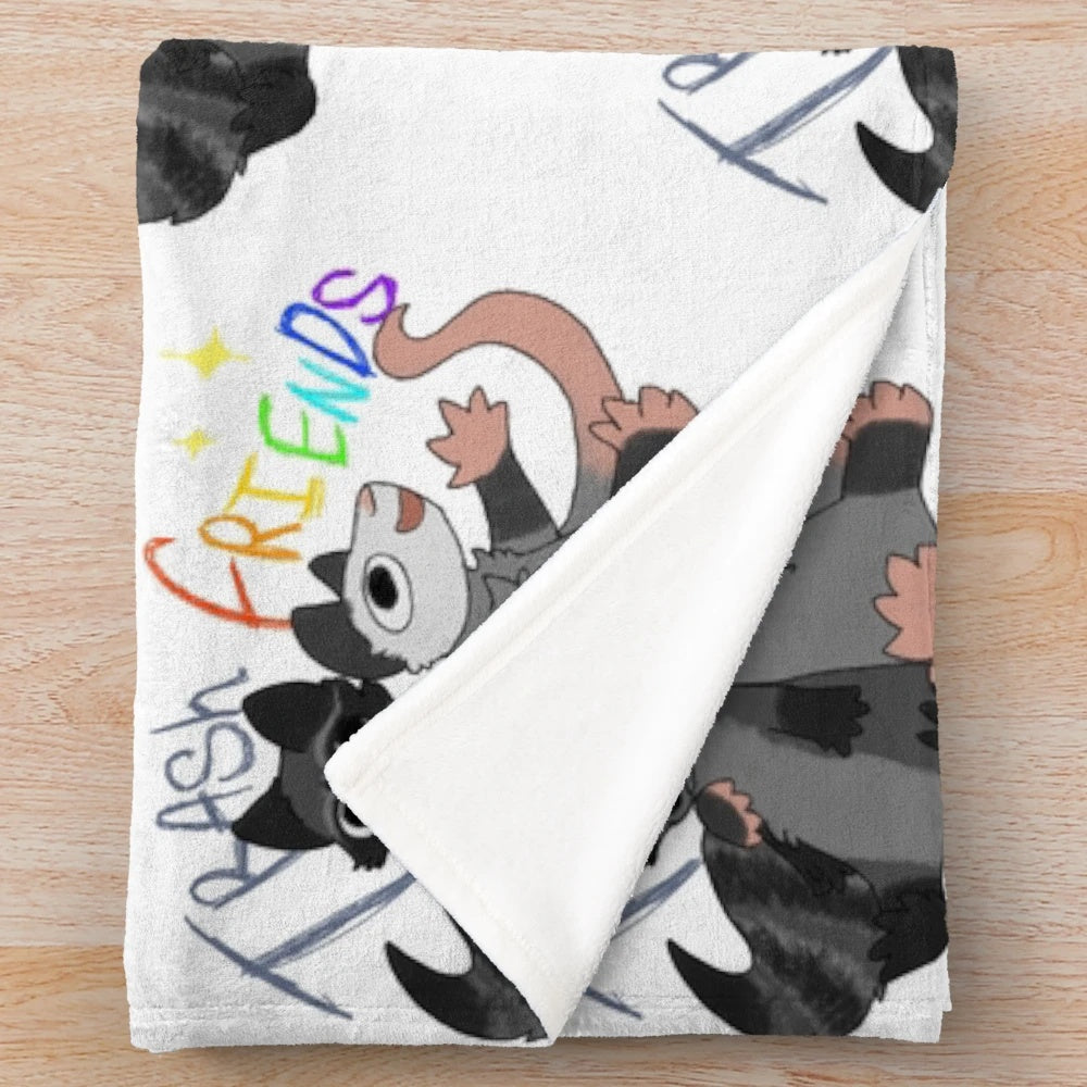 Soft plush blanket featuring opossum and raccoon designs