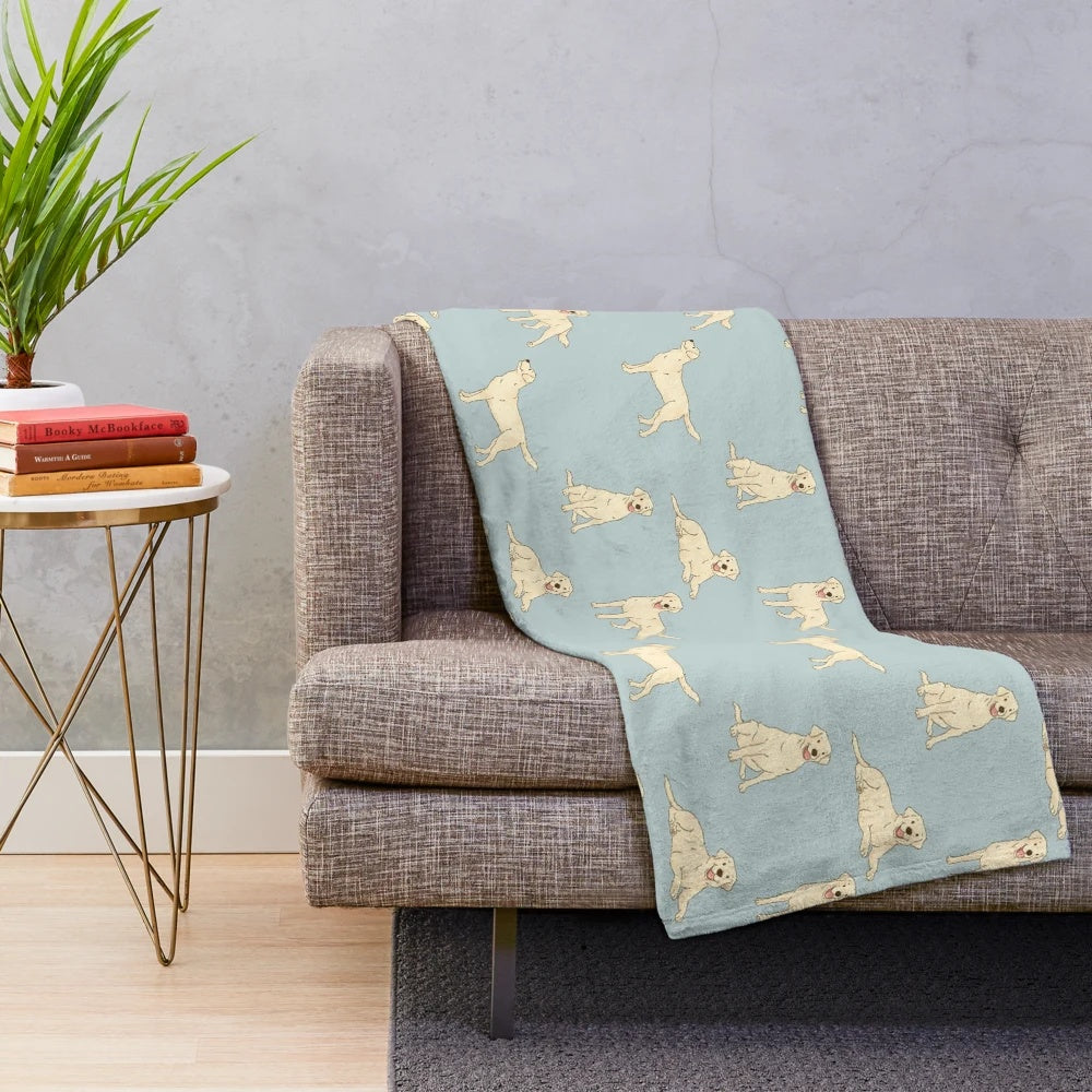 Soft and cuddly plush blanket featuring a cute yellow labrador retriever dog design