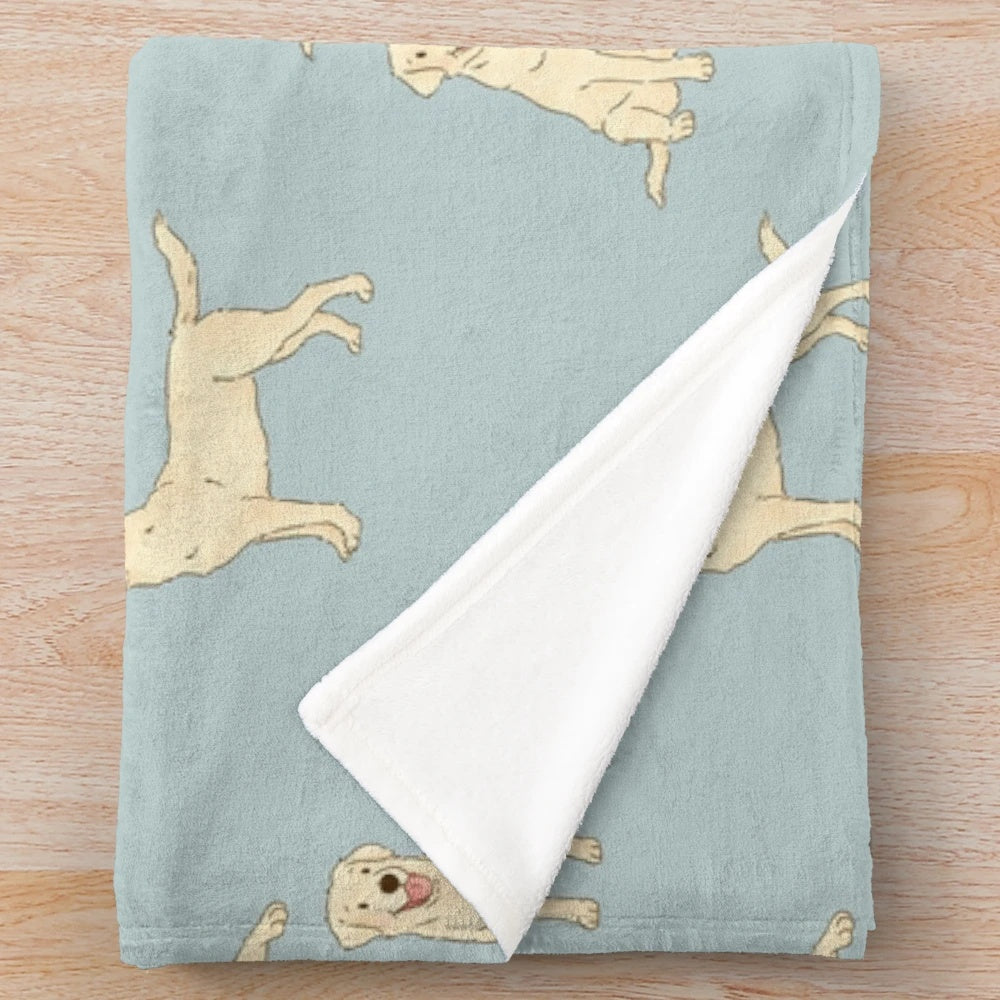 Soft and cuddly plush blanket featuring a cute yellow labrador retriever dog design