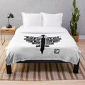 Cozy plush blanket featuring an Ainu-inspired amip design and tonkori silhouette