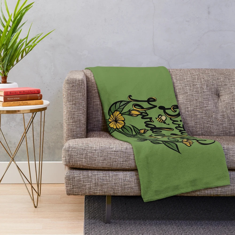 Plush blanket with a colorful and humorous "Dirty Garden Hoe" design
