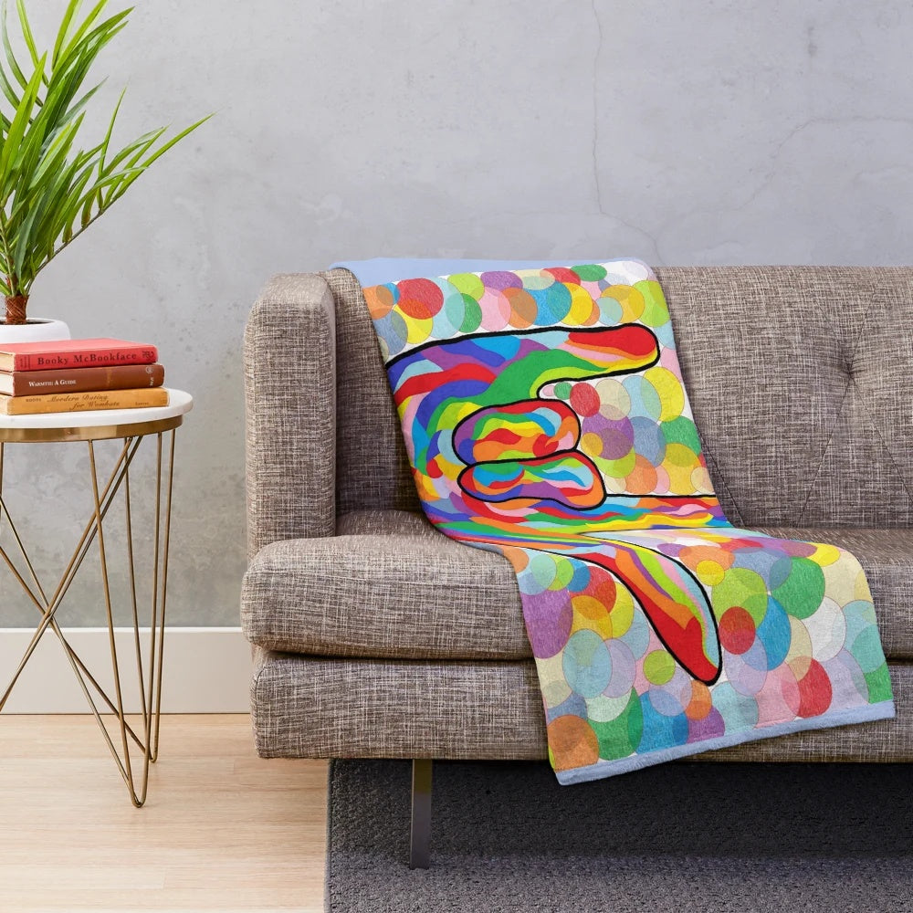 Plush blanket with American Sign Language "I Love You" on a bubble background